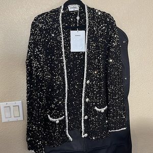 Chanel Cardigan sequence FR 40 with garment bag: